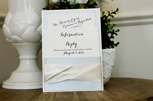 Invitation 1544: White Gold, Silver Ore, Cream Smooth, Silver Ribbon, Silver Ribbon, Antique Ribbon, Antique Ribbon - This is a portrait invite that uses four thick ribbons wrapped around a silver backing to create a pocket that holds the invitation wording.