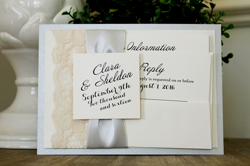 Invitation 1554: Silver Ore, Cream Smooth, Silver Ribbon, Cream Lace - This invite has the invite wording printed on the right side and the left side has lace and satin ribbon wrapped around the card.