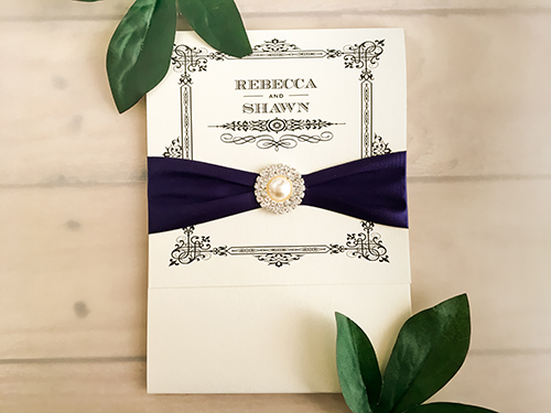 Invitation 1601: White Gold, White Gold, Navy Ribbon, Brooch/Buckle G - This is a white gold pearl wedding invite pocketfolder with a navy ribbon and brooch around cover flap.