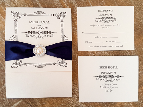 Invitation 1601: White Gold, White Gold, Navy Ribbon, Brooch/Buckle G - This is a white gold pearl wedding invite pocketfolder with a navy ribbon and brooch around cover flap.