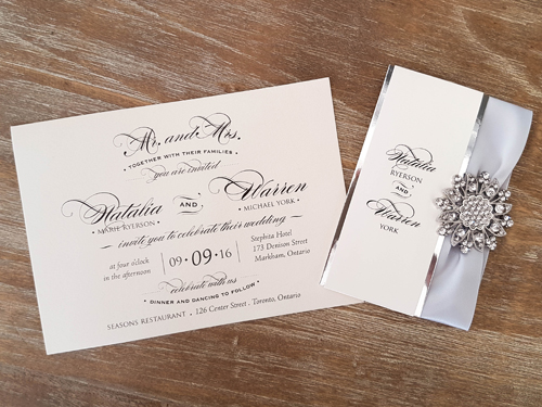 Invitation 1649: White Gold, White Gold, Silver Ribbon, Brooch/Buckle A11 - This is a single card wedding invite on white gold pearl.  There is silver mirror layered belly band with a ribbon and brooch.