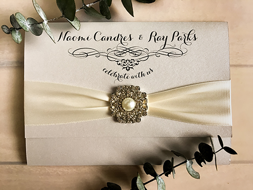 Invitation 1683: Silver Ore, Silver Ore, Antique Ribbon, Brooch/Buckle Q - This is a silver ore pearl 3/4 flap pocket folder design with a ribbon and brooch around the cover.