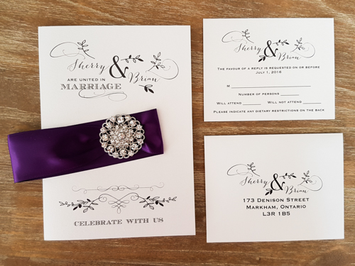 Invitation 1693: Ice Pearl, Ice Pearl, Purple Ribbon, Brooch/Buckle X - This is a full flap ice pearl pocket fold wedding invitation.  There is a ribbon and brooch design around the invite.