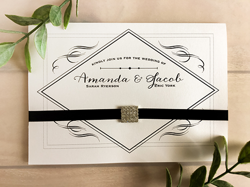 Invitation 1715: Antique Pearl, Antique Pearl, Black Ribbon, Brooch/Buckle I - This is an antique pearl full flap pocket folder wedding invite.  There is a ribbon and small brooch on the front.