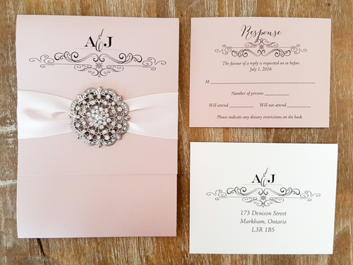 Invitation 1823: Blush Pearl, Blush Pearl, Blush Ribbon, Brooch/Buckle A20 - This is a vertically opening pocketfold wedding invite printed on the blush pearl paper.  There is a blush ribbon and brooch detail.