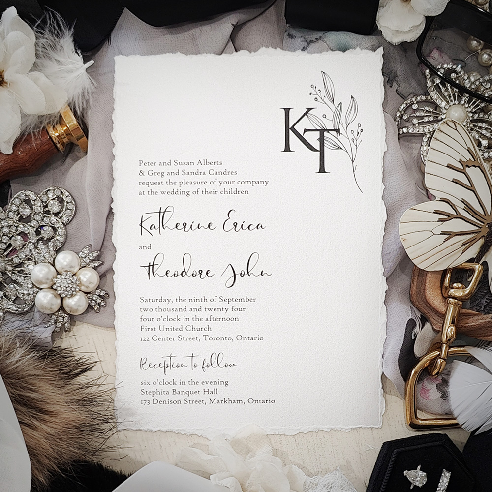 Invitation 2821: Ice Pearl - Deckle edge wedding invite on a white paper with a monogram design.