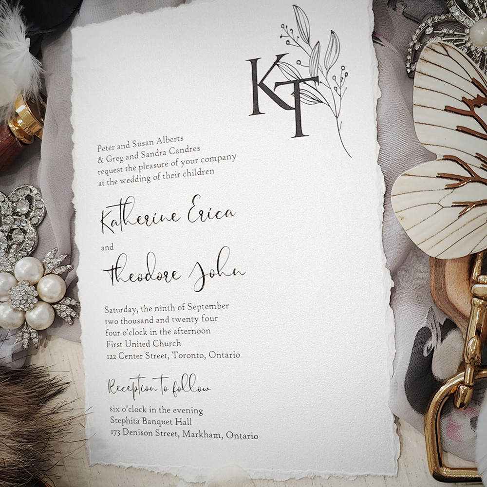 Invitation 2821: Ice Pearl - Deckle edge wedding invite on a white paper with a monogram design.