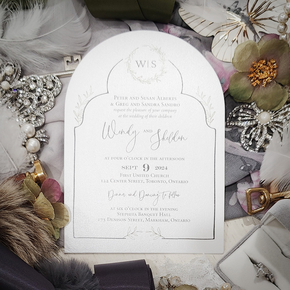 Invitation 2849: Ice Pearl - Arched cut wedding card with an arch design printed on the layout with hints of florals.