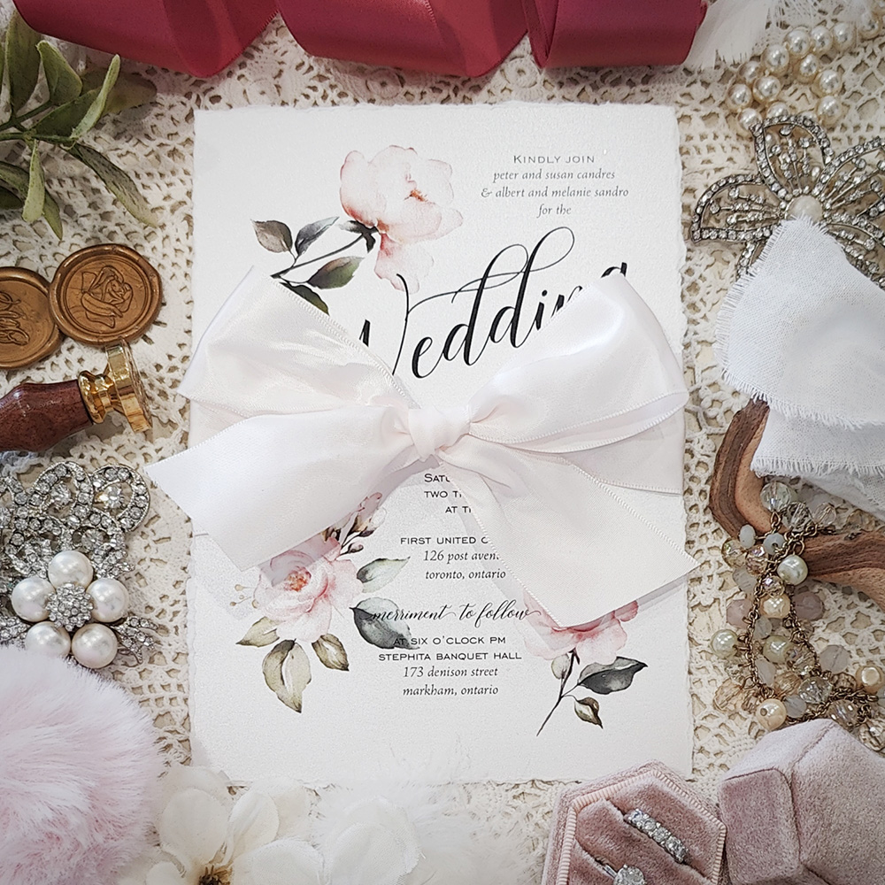 Invitation 3809: Ice Pearl, Antique Ribbon - Deckled edge wedding invite on an ice pearl paper with an antique bow around.