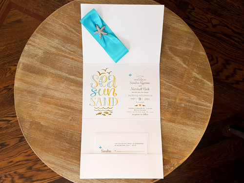 Invitation Destination13: Ice Pearl, Turquoise Ribbon, Brooch/Buckle A10 - This is a single card invite design printed on ice pearl with a turquoise ribbon in the middle with a starfish brooch design.