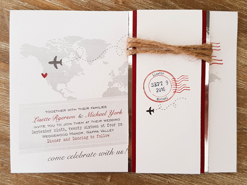 Invitation Destination14: This is a travel destination wedding invite.  There is a map of the world.  Double layered belly band using silver and red colors.  There is also twine.