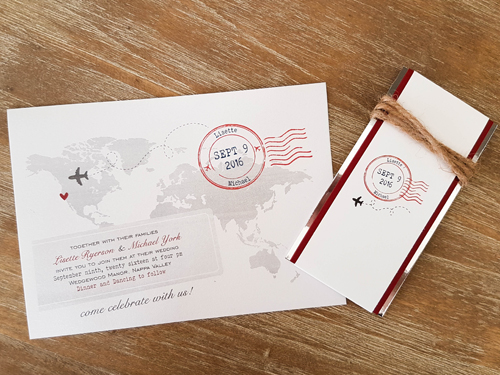 Invitation Destination14: This is a travel destination wedding invite.  There is a map of the world.  Double layered belly band using silver and red colors.  There is also twine.