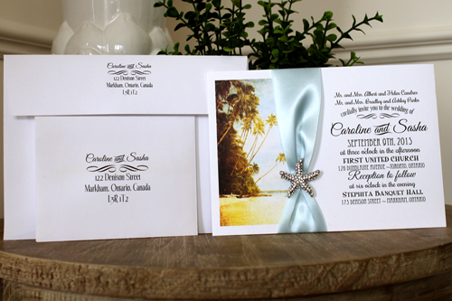 Invitation Destination7: Ice Pearl, White Smooth, Light Blue Ribbon, Brooch/Buckle A10 - This is a single card invite on ice pearl with a light blue ribbon wrapped around.  There is a starfish brooch.
