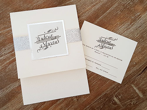 Invitation 2115: White Gold, Silver Mirror, Cream Smooth - This is a vertical pocket folder on white gold pearl paper.  There is silver glitter band and silver mirror layered cover tag.