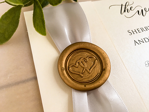Invitation 2129: Ivory Pearl, Gold Wax, Silver Ribbon - This is a folded over wedding invite on ivory pearl with a silver ribbon and gold wax seal design.
