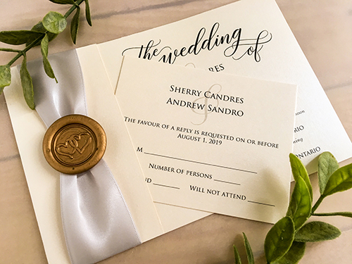 Invitation 2129: Ivory Pearl, Gold Wax, Silver Ribbon - This is a folded over wedding invite on ivory pearl with a silver ribbon and gold wax seal design.