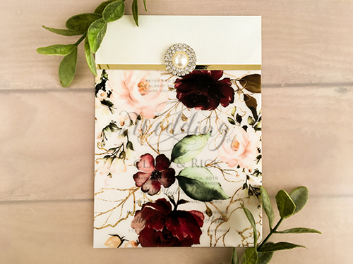 Invitation 2138: White Gold, Gold Mirror, Brooch/Buckle Q - This is a white gold pearl wedding invitation with a floral print and brooch detail.