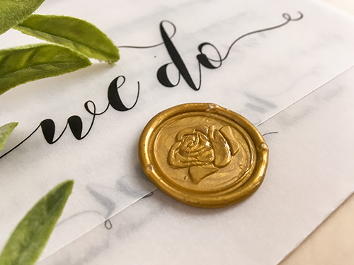 Invitation 2205: This invitation opens up and down into a three fold invitation.  The wax seal closes the invitation.  It is printed on our vellum paper also known as rice paper.