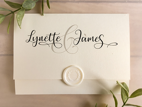 Invitation 2206: This is an invitation that opens up and down and has a wax seal on the cover.  It uses our white gold pearl paper and an ivory coloured stamp with a wreath print.