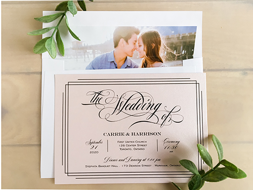 Invitation 2226: The unique feature of this invitation is the bride and groom's photo printed on the envelope liner.  It is a beautiful accent piece to this simple single card invitation.