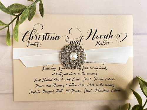 Invitation 2234: Champagne Gold, Antique Ribbon, Brooch/Buckle A6 - This is a landscape wedding card printed on a champagne gold paper.  There is a antique ribbon horizontally with a pearl brooch in the middle.