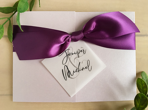 Invitation 2238: Orchid Pearl, Grape Ribbon - This is a landscape wedding invitation printed on an orchid pearl paper.  There is a gate fold vellum wrap and thick grape ribbon with  cover tag.