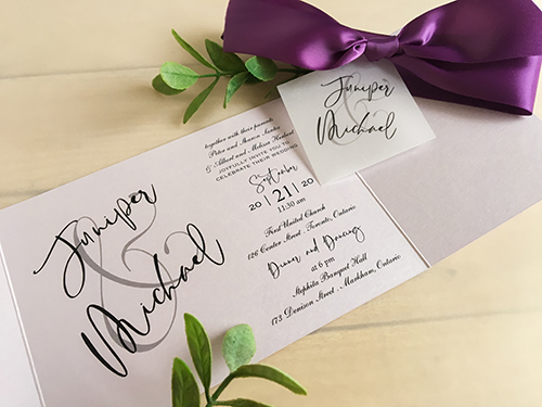 Invitation 2238: Orchid Pearl, Grape Ribbon - This is a landscape wedding invitation printed on an orchid pearl paper.  There is a gate fold vellum wrap and thick grape ribbon with  cover tag.