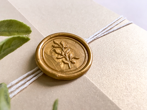 Invitation 2245: Champagne Gold, Gold Wax - This is a gate fold wedding invite in the champagne gold paper.  There is a string tied around the card with a gold branch wax seal.