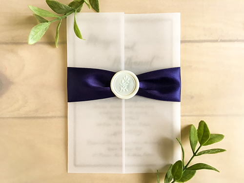 Invitation 2266: Ivory Wax, Navy Ribbon - This is a vellum gate fold wedding invite.  The text is printed directly on the vellum.  There is a navy ribbon and ivory branch wax seal.