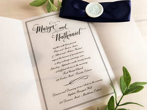 Invitation 2266: Ivory Wax, Navy Ribbon - This is a vellum gate fold wedding invite.  The text is printed directly on the vellum.  There is a navy ribbon and ivory branch wax seal.
