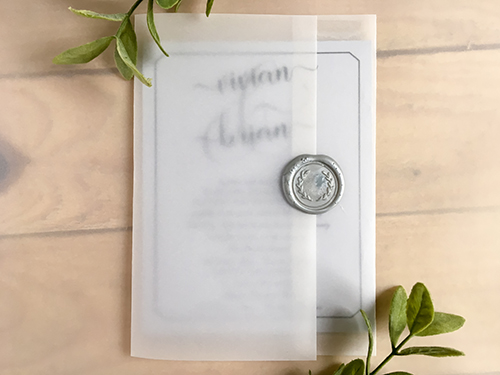 Invitation 2268: White Silver, Silver Wax - This is a vellum pocket style invite that holds a white silver single card invite.  There is a silver wreath wax seal on the flap.