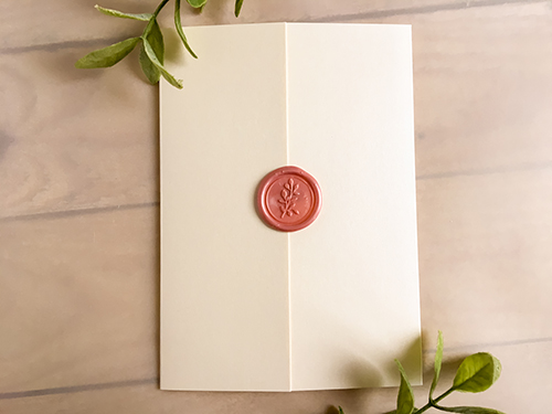 Invitation 2277: Ivory Pearl, Blush Wax - This is a solid ivory pearl gate fold invitation.  There is a blush wax seal with a branch design.  The main layout is printed in black ink.