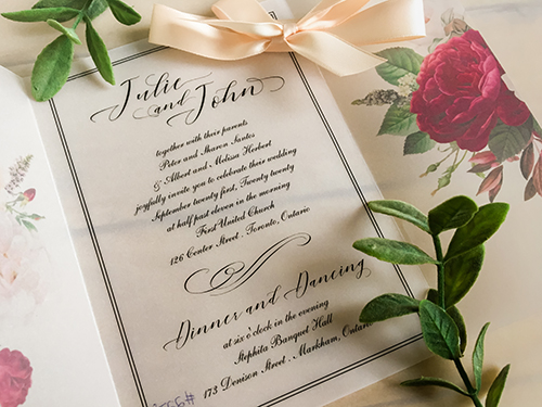 Invitation 2278: Blush Ribbon - This is a vellum gate fold invitation with a 5/8 blush bow tied around the invite.  There is a large floral design on the cover.