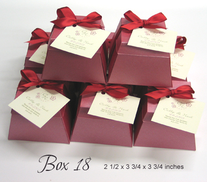 Favour Box Box18: Raspberry Pearl, Red Ribbon - The shape of this box is like a gold bar - it can hold cake and other medium sized items.