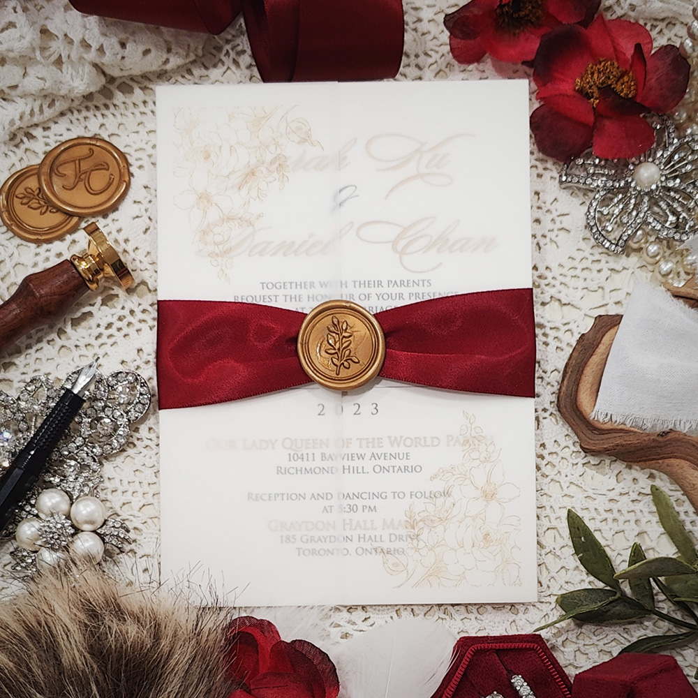 Invitation 5207: Ivory Shimmer, Gold Wax, Sherry Ribbon - gold foil and black invitation with floral vellum wrap and ribbon and wax seal