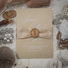 Invitation 3702: Gold Pearl, Gold Wax, Champagne Ribbon - White ink printing on a gold pearl paper with champagne ribbon and gold wax seal.
