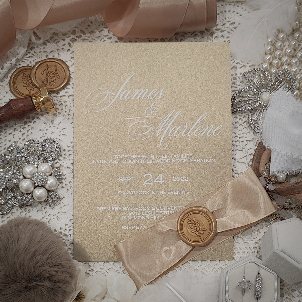 Invitation 3702: Gold Pearl, Gold Wax, Champagne Ribbon - White ink printing on a gold pearl paper with champagne ribbon and gold wax seal.