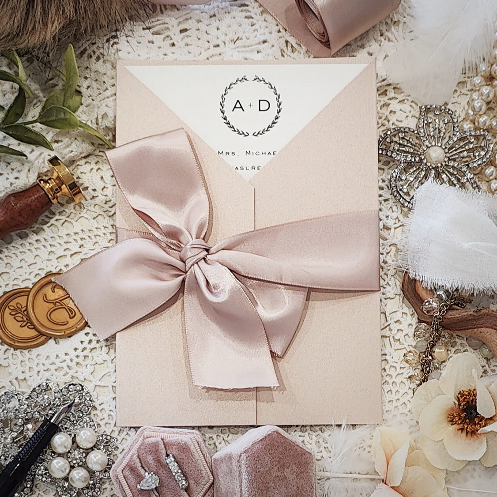 Invitation 3308: Blush Pearl, Cream Smooth, Deep Blush Ribbon - Blush gatefold wedding invitation with a deep blush bow tied around.