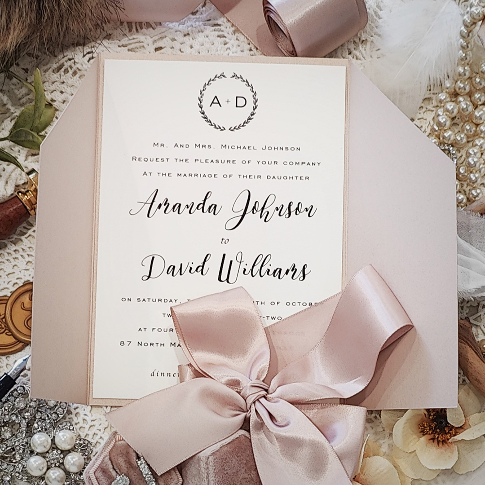 Invitation 3308: Blush Pearl, Cream Smooth, Deep Blush Ribbon - Blush gatefold wedding invitation with a deep blush bow tied around.