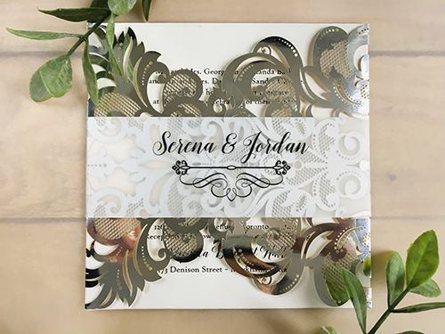 Invitation lc108: Mirror Silver, Cream Smooth - This is a silver mirror gate fold style laser cut wedding invitation.  There is also a vellum printed belly band.