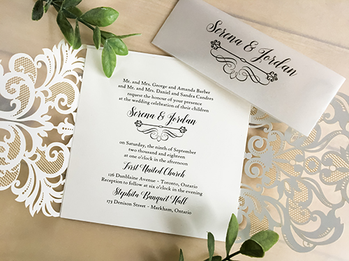 Invitation lc108: Mirror Silver, Cream Smooth - This is a silver mirror gate fold style laser cut wedding invitation.  There is also a vellum printed belly band.