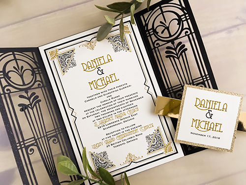 Invitation lc123: Glittering Black, Gold Glitter, White Smooth - This is a glittering black art deco laser cut wedding invitation.  There is a gold mirror belly band with a gold glitter layered cover tag.