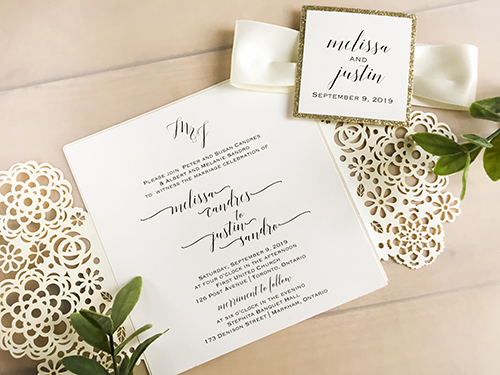 Invitation lc124: Ivory Shimmer, Champagne Glitter, Cream Smooth, Antique Ribbon - This is an ivory shimmer gate fold laser cut wedding design.  There is an antique ribbon with a champagne glitter layered cover tag.