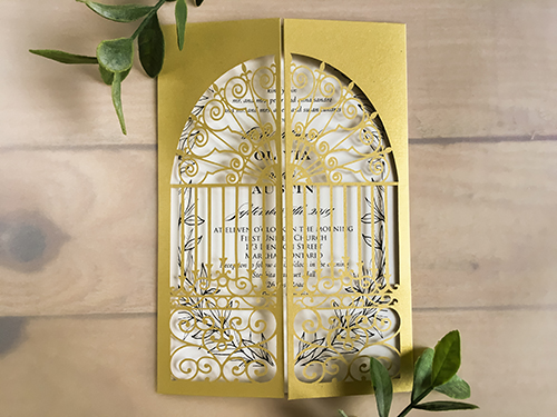 Invitation lc131: Metallic Gold, Cream Smooth - This is a metallic gold laser cut wedding invitation.  The laser cut pattern is an intricate gate design.