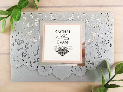 Invitation lc13: Rectangular laser cut invitations with double layered cover tag. Cover tag uses both pearl paper and mirror paper and is attached on to the lace cut out design.