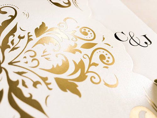 Invitation lc141: Ivory Shimmer - This is a special laser cut with a gold foil printed damask pattern on the pocket.  The insert is loose.