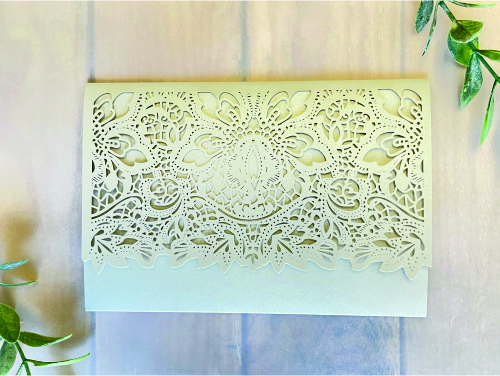 Invitation lc151: Champagne Gold, Cream Smooth - This is a champagne gold laser cut wedding invite.  There is a very unique pattern on the cover flap design.