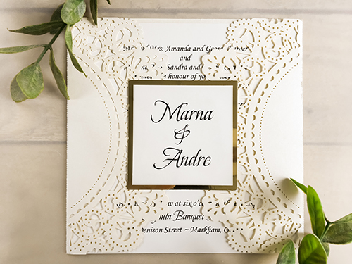Invitation lc22: Ivory Shimmer, Gold Mirror, Cream Smooth - This is an ivory shimmer laser cut wedding card.  The cover tag on the flap has a gold mirror backing.