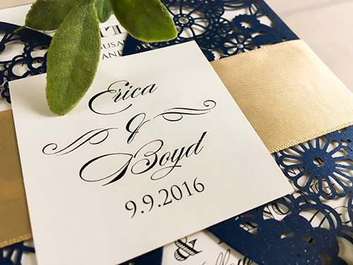 Invitation lc41: Glittering Navy, Cream Smooth, Champagne Ribbon - This is a glittering navy rounded design laser cut wedding card  There is a flat champagne ribbon and single cover tag.