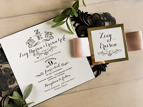 Invitation lc69: Glittering Black, Gold Mirror, Cream Smooth, Deep Blush Ribbon - This is a glittering black gate fold laser cut wedding invite with a deep blush ribbon and gold mirror backing on the cover.